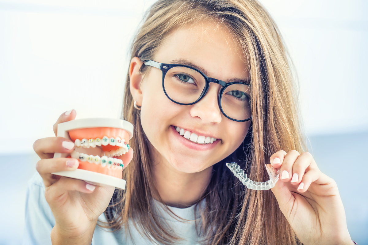 Comparing Metal Braces, Clear Braces, & Invisalign